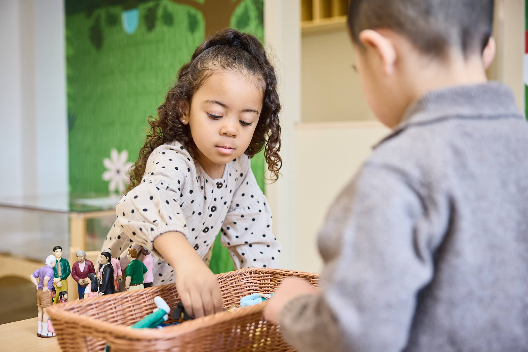 Two Preschool children engaging in open ended play