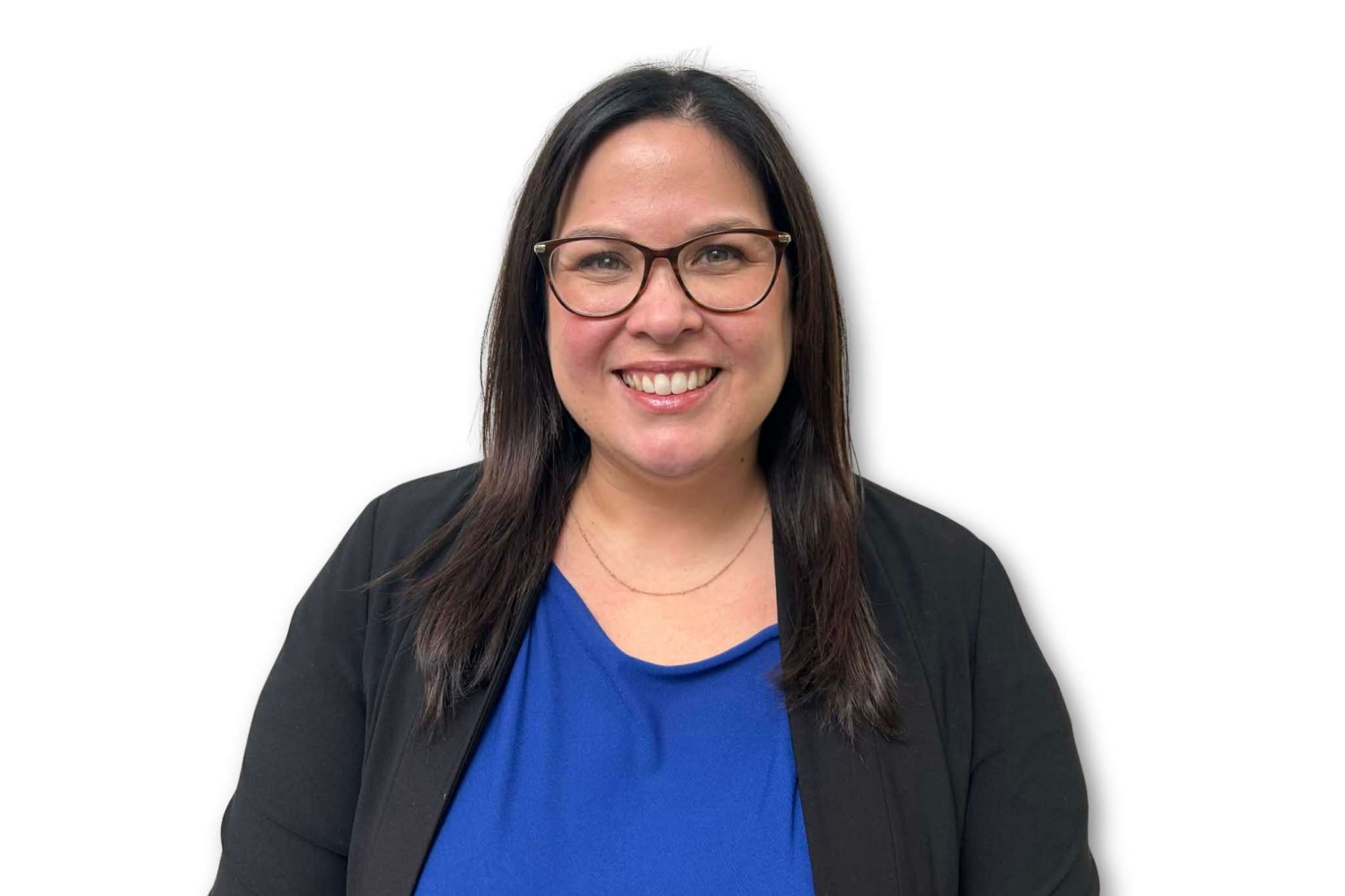 Woman looking at camera and smiling, wearing a blue shirt and black blazer.